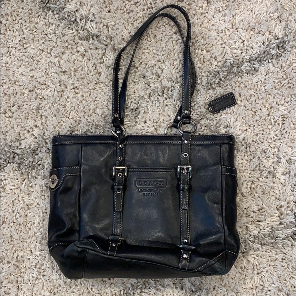 Coach purse, black in color shoulder bag